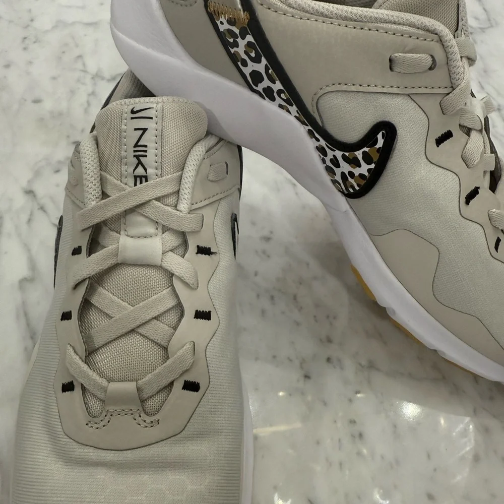 EXCELLENT Nike Legend Essential 2 Cream Sneakers with Leopard Print Size 9 - Picture 10 of 11